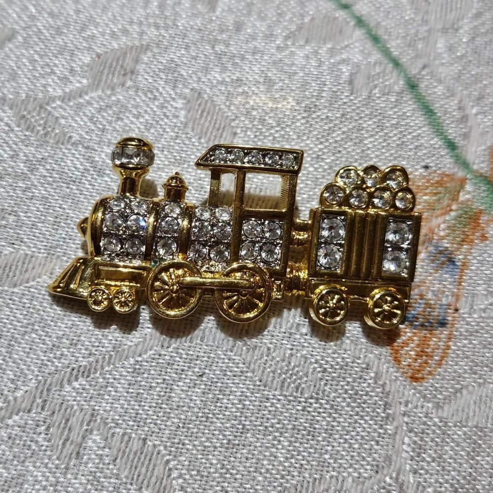 vintage gold tone train rhinestones brooch